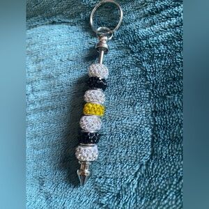 Elegant Beaded Keychain with Silver and Yellow Accents